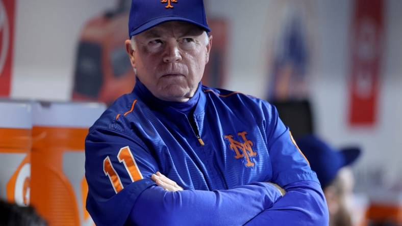 Sep 28, 2023; New York City, New York, USA; New York Mets manager Buck Showalter (11) looks on from the dugout before a game against the Miami Marlins at Citi Field. Mandatory Credit: Brad Penner-USA TODAY Sports