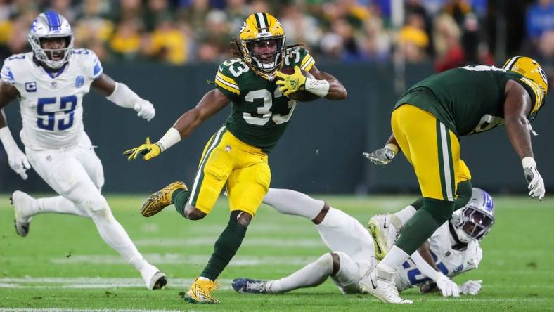 Green Bay Packers running back Aaron Jones (33) runs the ball against the Detroit Lions during their football game on Thursday, September 28, 2023, at Lambeau Field in Green Bay, Wis. The Lions won the game, 34-20.
Tork Mason/USA TODAY NETWORK-Wisconsin