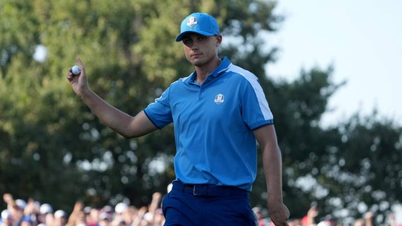 Sep 29, 2023; Rome, ITA; Team Europe golfer Ludvig Aberg celebrates after making his putt on the ninth green during day one foursomes round for the 44th Ryder Cup golf competition at Marco Simone Golf and Country Club. Mandatory Credit: Kyle Terada-USA TODAY Sports