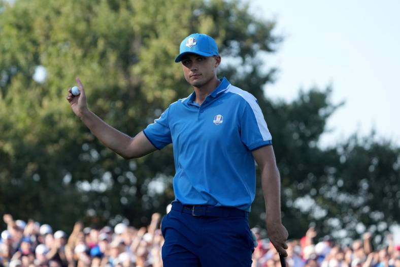 Sep 29, 2023; Rome, ITA; Team Europe golfer Ludvig Aberg celebrates after making his putt on the ninth green during day one foursomes round for the 44th Ryder Cup golf competition at Marco Simone Golf and Country Club. Mandatory Credit: Kyle Terada-USA TODAY Sports