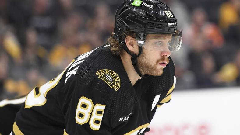 Sep 29, 2023; Boston, Massachusetts, USA;  Boston Bruins right wing David Pastrnak (88) gets ready for a face-off during the second period against the Philadelphia Flyers at TD Garden. Mandatory Credit: Bob DeChiara-USA TODAY Sports