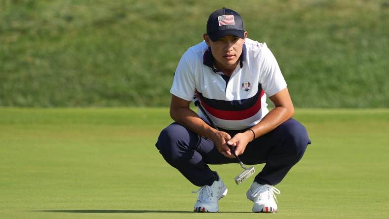 Sep 30, 2023; Rome, ITALY;  Team USA golfer Collin Morikawa lines up a putt on the 15th green during day two fourballs round for the 44th Ryder Cup golf competition at Marco Simone Golf and Country Club. Mandatory Credit: Kyle Terada-USA TODAY Sports