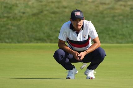 Sep 30, 2023; Rome, ITALY;  Team USA golfer Collin Morikawa lines up a putt on the 15th green during day two fourballs round for the 44th Ryder Cup golf competition at Marco Simone Golf and Country Club. Mandatory Credit: Kyle Terada-USA TODAY Sports