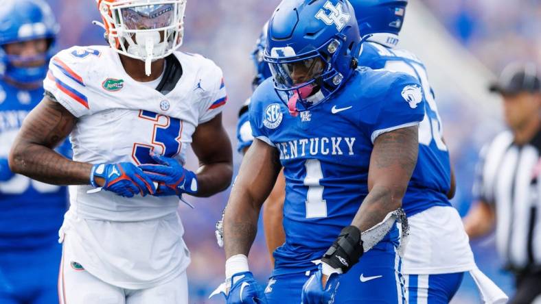 Sep 30, 2023; Lexington, Kentucky, USA; Kentucky Wildcats running back Ray Davis (1) celebrates during the fourth quarter against the Florida Gators at Kroger Field. Mandatory Credit: Jordan Prather-USA TODAY Sports