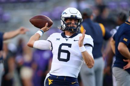 Sep 30, 2023; Fort Worth, Texas, USA; West Virginia Mountaineers quarterback Garrett Greene (6) throws a pass before the game against the TCU Horned Frogs at Amon G. Carter Stadium. Mandatory Credit: Tim Heitman-USA TODAY Sports