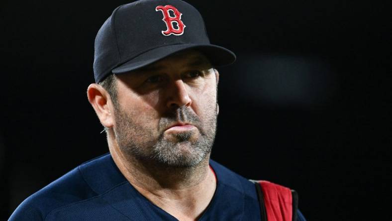 Sep 30, 2023; Baltimore, Maryland, USA;  Boston Red Sox game planning coordinator/catching coach Jason Varitek (33) walks on the field before the game against the Baltimore Orioles at Oriole Park at Camden Yards. Mandatory Credit: Tommy Gilligan-USA TODAY Sports