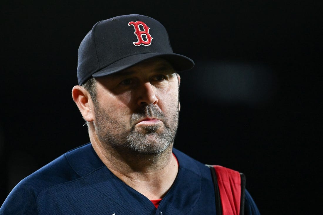 Sep 30, 2023; Baltimore, Maryland, USA;  Boston Red Sox game planning coordinator/catching coach Jason Varitek (33) walks on the field before the game against the Baltimore Orioles at Oriole Park at Camden Yards. Mandatory Credit: Tommy Gilligan-USA TODAY Sports