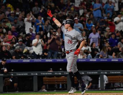 Sep 30, 2023; Denver, Colorado, USA; Minnesota Twins right fielder Max Kepler (26) points to the stands after his three run home run in the sixth inning against the Colorado Rockies at Coors Field. Mandatory Credit: John Leyba-USA TODAY Sports