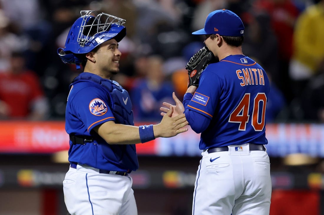 Sep 30, 2023; New York City, New York, USA; New York Mets catcher Francisco Alvarez (4) celebrates with relief pitcher Drew Smith (40) after defeating the Philadelphia Phillies at Citi Field. Mandatory Credit: Brad Penner-USA TODAY Sports