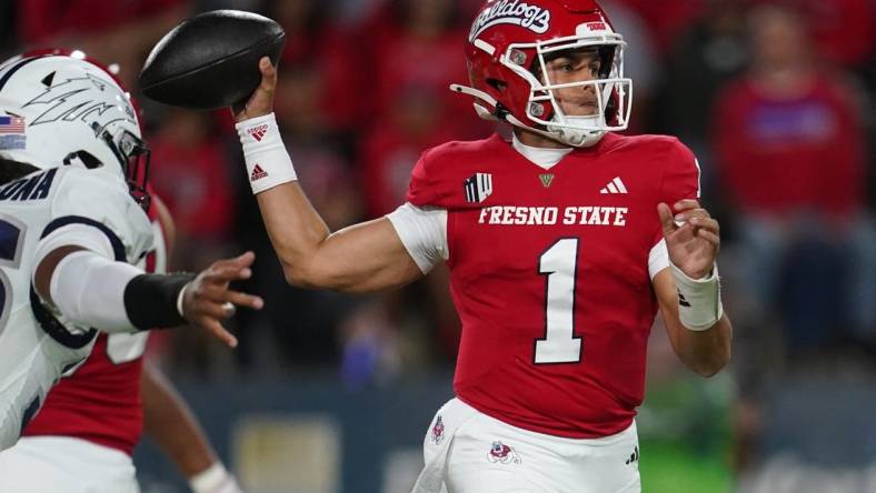 Sep 30, 2023; Fresno, California, USA; Fresno State Bulldogs quarterback Mikey Keene (1) throws a pass against the Nevada Wolf Pack in the first quarter at Valley Children's Stadium. Mandatory Credit: Cary Edmondson-USA TODAY Sports