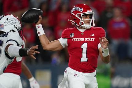 Sep 30, 2023; Fresno, California, USA; Fresno State Bulldogs quarterback Mikey Keene (1) throws a pass against the Nevada Wolf Pack in the first quarter at Valley Children's Stadium. Mandatory Credit: Cary Edmondson-USA TODAY Sports