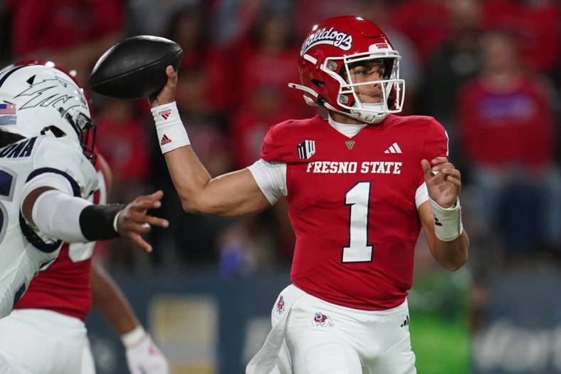 Sep 30, 2023; Fresno, California, USA; Fresno State Bulldogs quarterback Mikey Keene (1) throws a pass against the Nevada Wolf Pack in the first quarter at Valley Children's Stadium. Mandatory Credit: Cary Edmondson-USA TODAY Sports