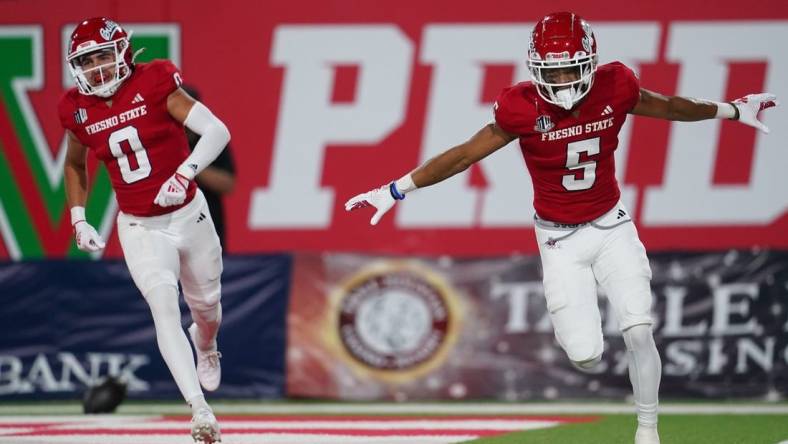 Sep 30, 2023; Fresno, California, USA; Fresno State Bulldogs wide receiver Jaelen Gill (5) reacts after catching a pass for a touchdown against the Nevada Wolf Pack in the first quarter at Valley Children's Stadium. Mandatory Credit: Cary Edmondson-USA TODAY Sports