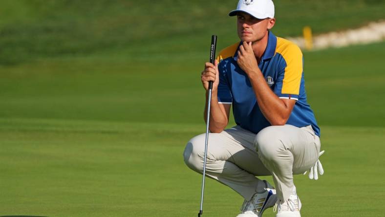 Oct 1, 2023; Rome, ITA; Team Europe golfer Ludvig Aberg lines up his putt on the 16th green during the final day of the 44th Ryder Cup golf competition at Marco Simone Golf and Country Club. Mandatory Credit: Kyle Terada-USA TODAY Sports