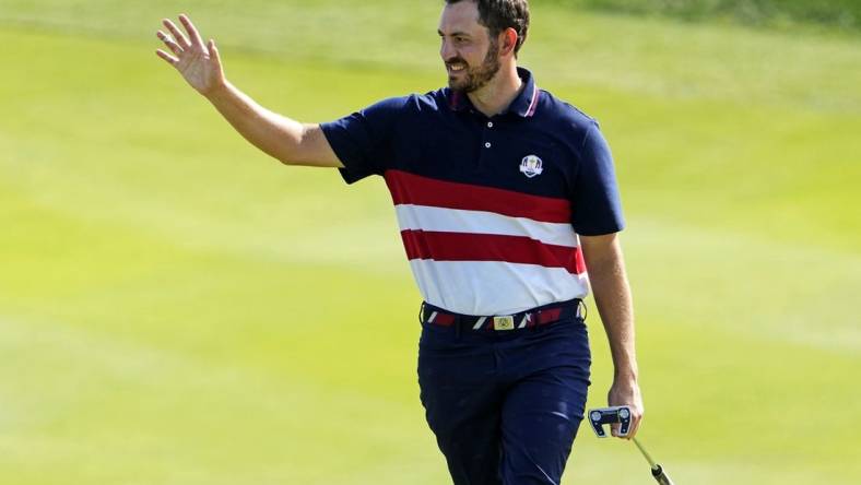 Oct 1, 2023; Rome, ITA; Team USA golfer Patrick Cantlay waves to the gallery on the 12th hole during the final day of the 44th Ryder Cup golf competition at Marco Simone Golf and Country Club. Mandatory Credit: Adam Cairns-USA TODAY Sports