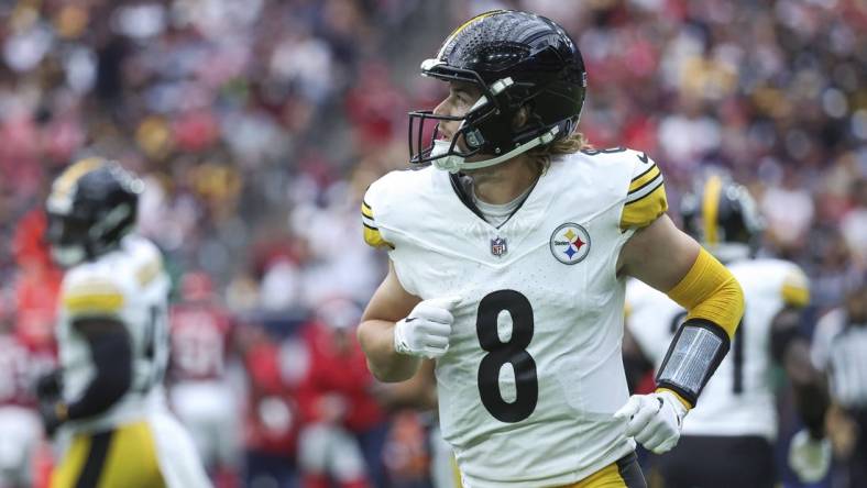 Oct 1, 2023; Houston, Texas, USA; Pittsburgh Steelers quarterback Kenny Pickett (8) jogs off the field after a play during the first quarter against the Houston Texans at NRG Stadium. Mandatory Credit: Troy Taormina-USA TODAY Sports