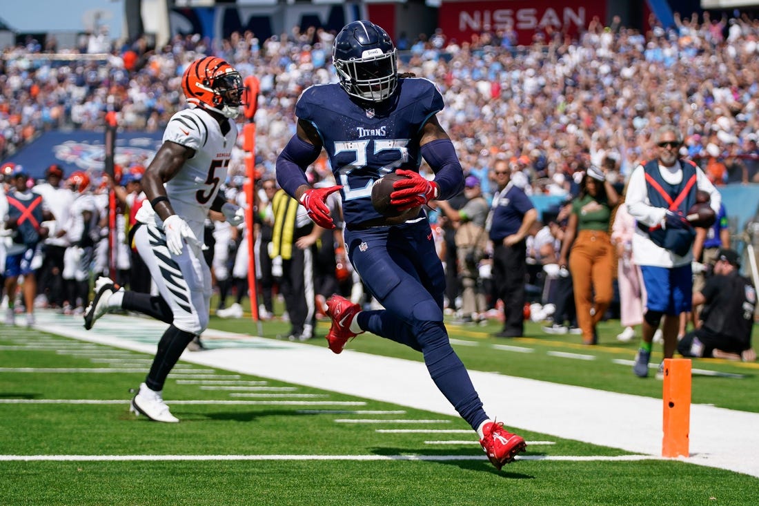 Henry runs for TD, throws for score as Tennessee Titans rout Burrow,  Cincinnati Bengals 27-3