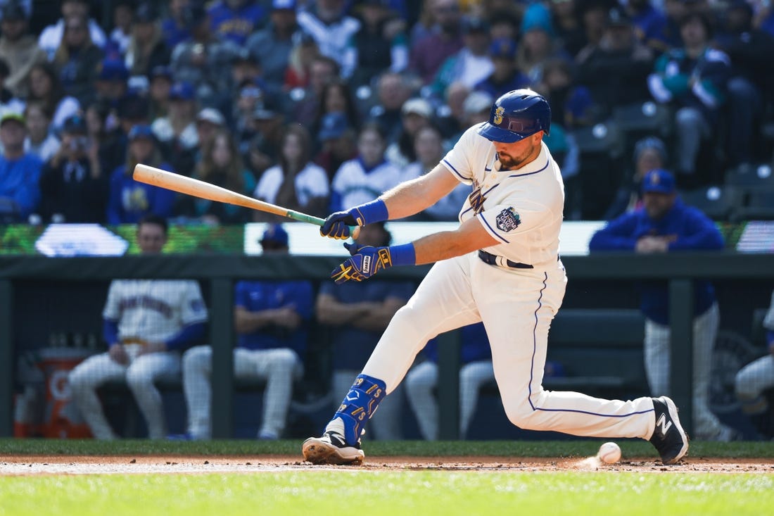 Oct 1, 2023; Seattle, Washington, USA; Seattle Mariners catcher Cal Raleigh (29) strikes out against the Texas Rangers to end the first inning at T-Mobile Park. Mandatory Credit: Joe Nicholson-USA TODAY Sports