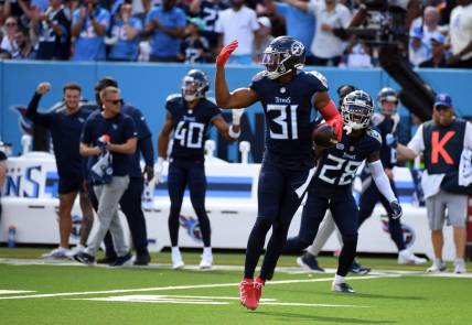 Oct 1, 2023; Nashville, Tennessee, USA; Tennessee Titans safety Kevin Byard (31) celebrates after recovering a fumble during the second half against the Cincinnati Bengals at Nissan Stadium. Mandatory Credit: Christopher Hanewinckel-USA TODAY Sports