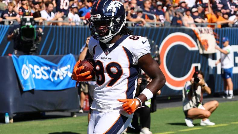 Oct 1, 2023; Chicago, Illinois, USA; Denver Broncos wide receiver Brandon Johnson (89) makes a touchdown catch against the Chicago Bears during the second half at Soldier Field. Mandatory Credit: Mike Dinovo-USA TODAY Sports