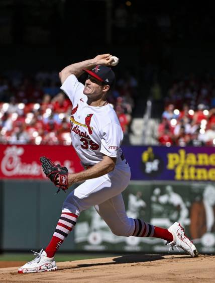 Oct 1, 2023; St. Louis, Missouri, USA;  St. Louis Cardinals starting pitcher Miles Mikolas (39) pitches against the Cincinnati Reds during the first inning at Busch Stadium. Mandatory Credit: Jeff Curry-USA TODAY Sports