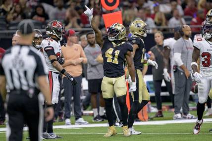 Oct 1, 2023; New Orleans, Louisiana, USA; New Orleans Saints running back Alvin Kamara (41) signals a first down against the Tampa Bay Buccaneers during the third quarter at the Caesars Superdome. Mandatory Credit: Matthew Hinton-USA TODAY Sports