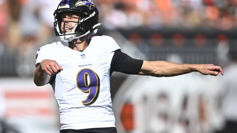 Oct 1, 2023; Cleveland, Ohio, USA; Baltimore Ravens place kicker Justin Tucker (9) watches his extra point in the second quarter against the Cleveland Browns at Cleveland Browns Stadium. Mandatory Credit: David Richard-USA TODAY Sports