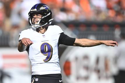 Oct 1, 2023; Cleveland, Ohio, USA; Baltimore Ravens place kicker Justin Tucker (9) watches his extra point in the second quarter against the Cleveland Browns at Cleveland Browns Stadium. Mandatory Credit: David Richard-USA TODAY Sports