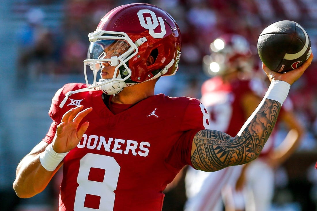 Oklahoma's Dillon Gabriel (8) warms up before an NCAA football game between University of Oklahoma (OU) and Iowa State at the Gaylord Family Oklahoma Memorial Stadium in Norman, Okla., on Saturday, Sept. 30, 2023.