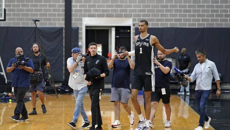 San Antonio Spurs center Victor Wembanyama (1) enters the court during media day in San Antonio. Mandatory Credit: Scott Wachter-USA TODAY Sports