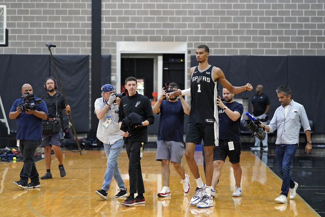 San Antonio Spurs center Victor Wembanyama (1) enters the court during media day in San Antonio. Mandatory Credit: Scott Wachter-USA TODAY Sports