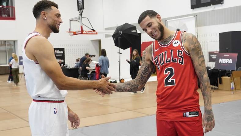 Oct 2, 2023; Chicago, IL, USA; Chicago Bulls guard Zach LaVine (8) and guard Lonzo Ball (2) talk during Chicago Bulls Media Day at Advocate Center. Mandatory Credit: David Banks-USA TODAY Sports