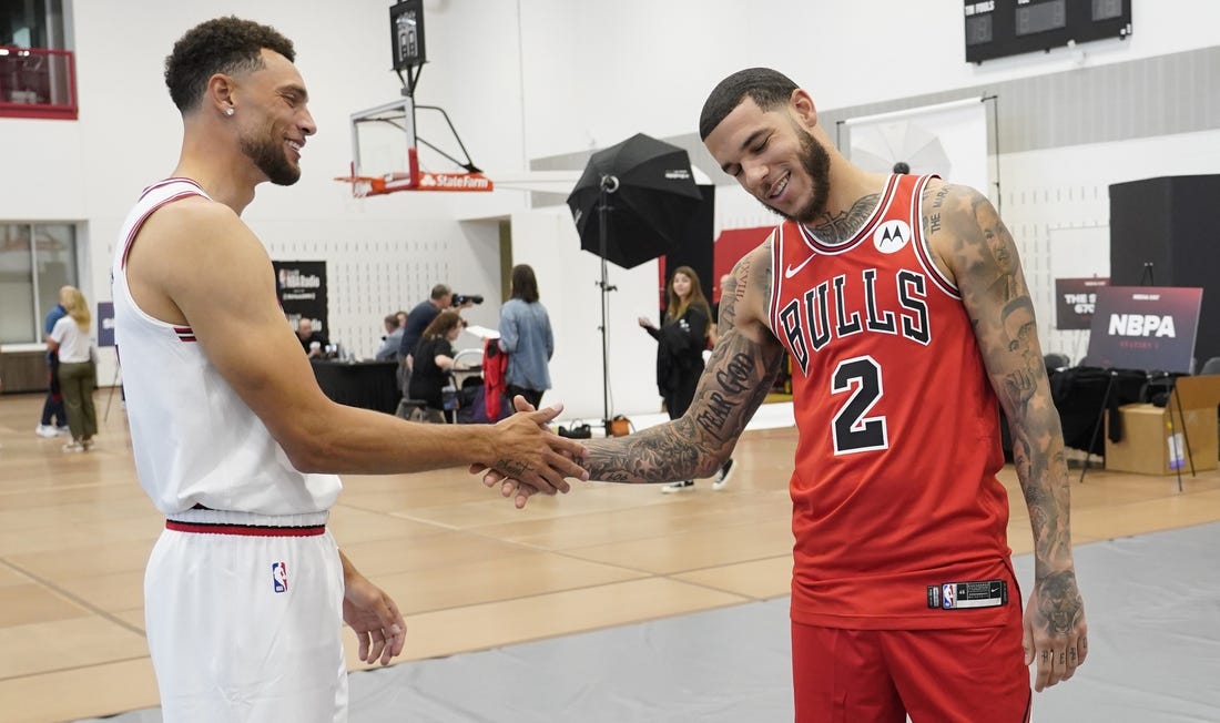 Oct 2, 2023; Chicago, IL, USA; Chicago Bulls guard Zach LaVine (8) and guard Lonzo Ball (2) talk during Chicago Bulls Media Day at Advocate Center. Mandatory Credit: David Banks-USA TODAY Sports