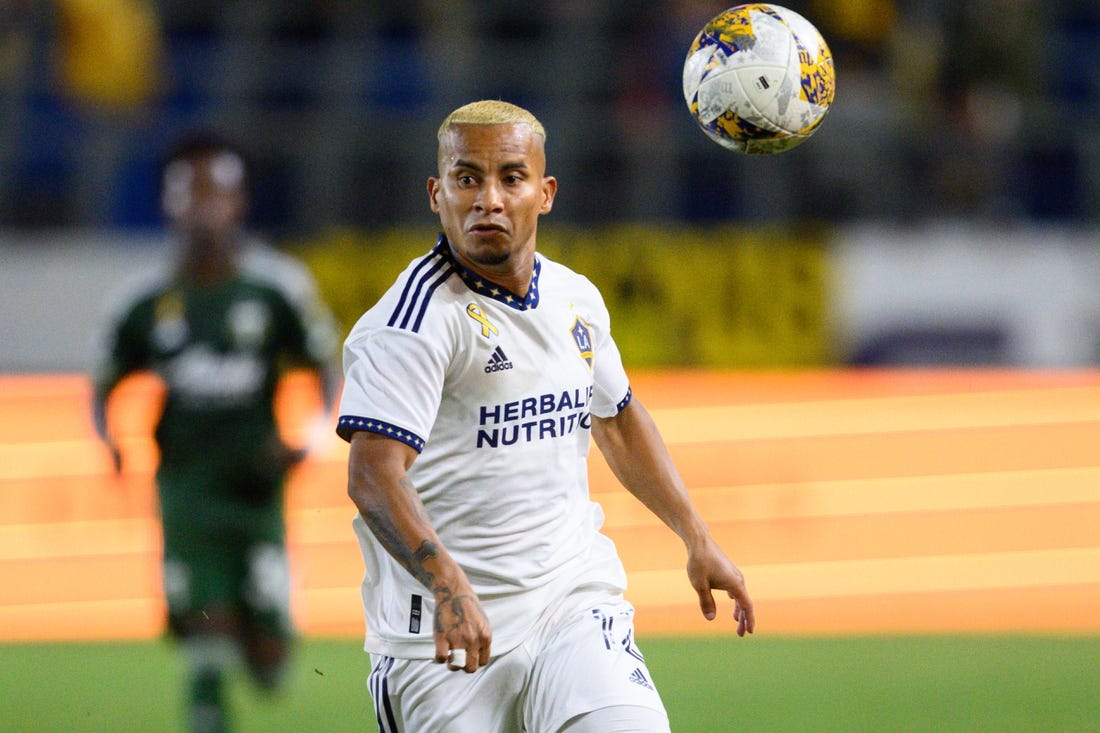 Sep 30, 2023; Carson, California, USA; LA Galaxy forward Michael Barrios (12) chases down the ball during the second half at Dignity Health Sports Park. Mandatory Credit: Kelvin Kuo-USA TODAY Sports