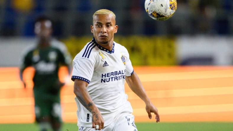 Sep 30, 2023; Carson, California, USA; LA Galaxy forward Michael Barrios (12) chases down the ball during the second half at Dignity Health Sports Park. Mandatory Credit: Kelvin Kuo-USA TODAY Sports