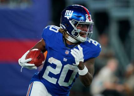 New York Giants running back Eric Gray (20) on a kick return in the first half at MetLife Stadium on Monday, Oct. 2, 2023, in East Rutherford.