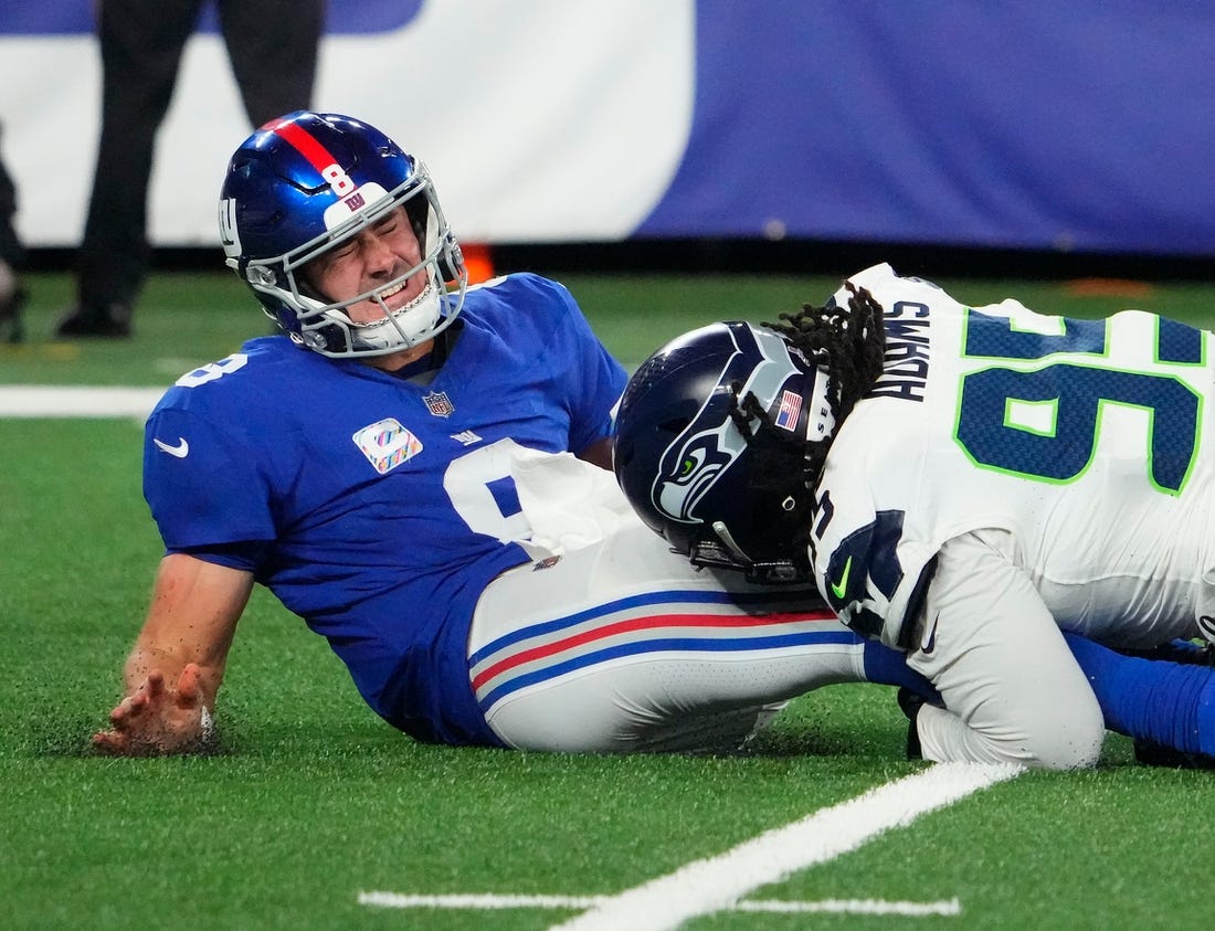 Seahawks QB Geno Smith returns after leaving game vs. Giants with knee  injury