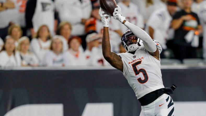 Sep 25, 2023; Cincinnati, Ohio, USA; Cincinnati Bengals wide receiver Tee Higgins (5) catches a pass against the Los Angeles Rams in the first half at Paycor Stadium. Mandatory Credit: Katie Stratman-USA TODAY Sports