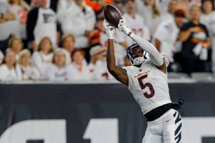 Sep 25, 2023; Cincinnati, Ohio, USA; Cincinnati Bengals wide receiver Tee Higgins (5) catches a pass against the Los Angeles Rams in the first half at Paycor Stadium. Mandatory Credit: Katie Stratman-USA TODAY Sports