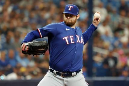 Oct 3, 2023; St. Petersburg, Florida, USA; Texas Rangers starting pitcher Jordan Montgomery (52) pitches against the Tampa Bay Rays in the second inning during game one of the Wildcard series for the 2023 MLB playoffs at Tropicana Field. Mandatory Credit: Kim Klement Neitzel-USA TODAY Sports
