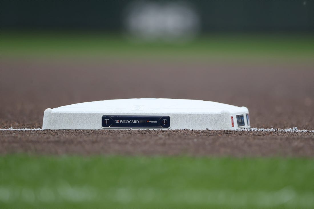 Oct 3, 2023; Minneapolis, Minnesota, USA; General view of the MLB wildcard logo displayed on a base before the game between the Minnesota Twins and the Toronto Blue Jays during game one of the Wildcard series for the 2023 MLB playoffs at Target Field. Mandatory Credit: Jesse Johnson-USA TODAY Sports