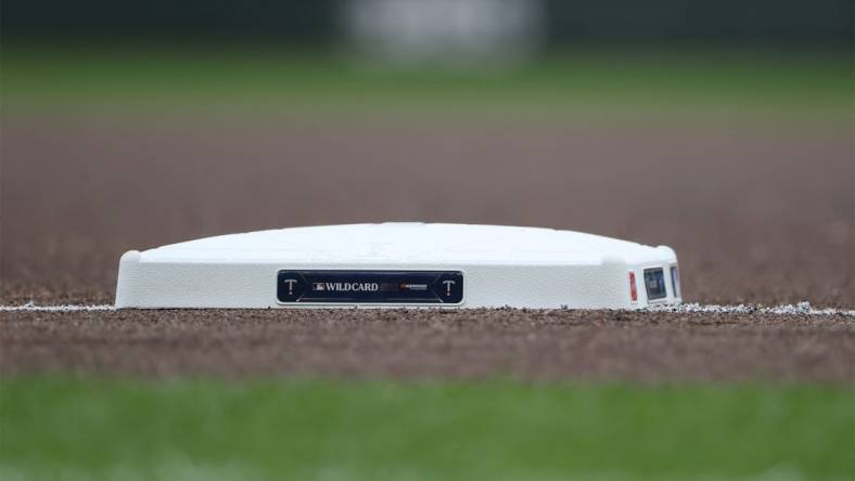 Oct 3, 2023; Minneapolis, Minnesota, USA; General view of the MLB wildcard logo displayed on a base before the game between the Minnesota Twins and the Toronto Blue Jays during game one of the Wildcard series for the 2023 MLB playoffs at Target Field. Mandatory Credit: Jesse Johnson-USA TODAY Sports