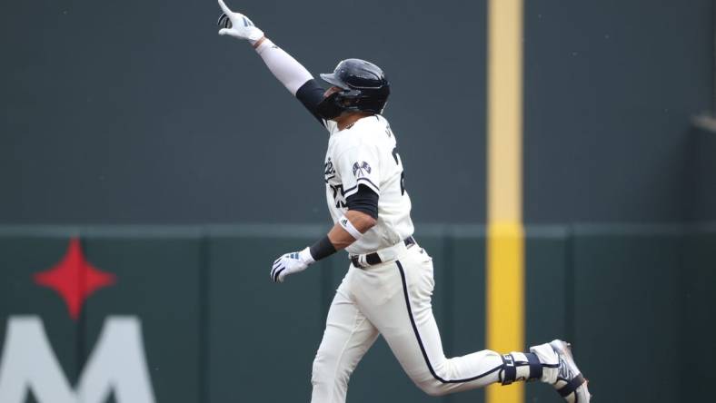 Oct 3, 2023; Minneapolis, Minnesota, USA; Minnesota Twins short stop Royce Lewis (23) celebrates after hitting a home run in the third inning against the Toronto Blue Jays during game one of the Wildcard series for the 2023 MLB playoffs at Target Field. Mandatory Credit: Jesse Johnson-USA TODAY Sports