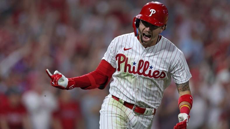 Oct 3, 2023; Philadelphia, Pennsylvania, USA; Philadelphia Phillies second baseman Bryson Stott (5) reacts after hitting a RBI single in the fourth inning against the Miami Marlins for game one of the Wildcard series for the 2023 MLB playoffs at Citizens Bank Park. Mandatory Credit: Bill Streicher-USA TODAY Sports