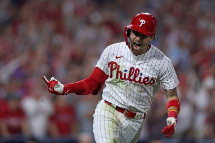 Oct 3, 2023; Philadelphia, Pennsylvania, USA; Philadelphia Phillies second baseman Bryson Stott (5) reacts after hitting a RBI single in the fourth inning against the Miami Marlins for game one of the Wildcard series for the 2023 MLB playoffs at Citizens Bank Park. Mandatory Credit: Bill Streicher-USA TODAY Sports