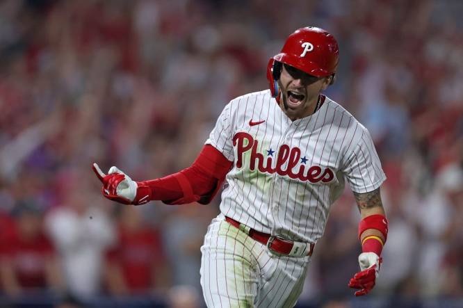 Bryson Stott of the Philadelphia Phillies hits a single during the