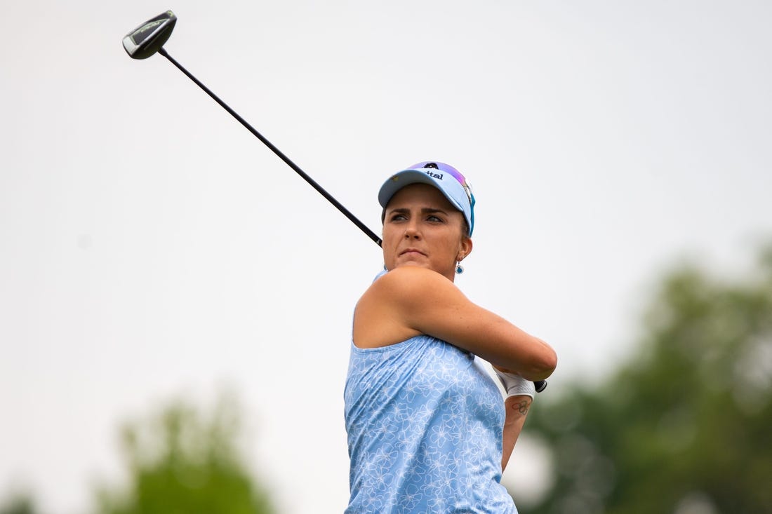 Lexi Thompson drives the ball down the fairway after teeing off in the Meijer LPGA Classic at Blythefield Country Club in Belmont, Mich., on June 15, 2023.