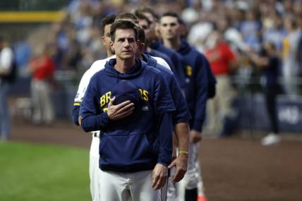 Oct 4, 2023; Milwaukee, Wisconsin, USA; Milwaukee Brewers manager Craig Counsell stands during the national anthem before game two against the Arizona Diamondbacks in the Wildcard series for the 2023 MLB playoffs at American Family Field. Mandatory Credit: Kamil Krzaczynski-USA TODAY Sports