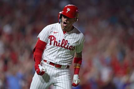 Oct 4, 2023; Philadelphia, Pennsylvania, USA; Philadelphia Phillies second baseman Bryson Stott (5) reacts after hitting  a grand slam against the Miami Marlins during the sixth inning for game two of the Wildcard series for the 2023 MLB playoffs at Citizens Bank Park. Mandatory Credit: Bill Streicher-USA TODAY Sports