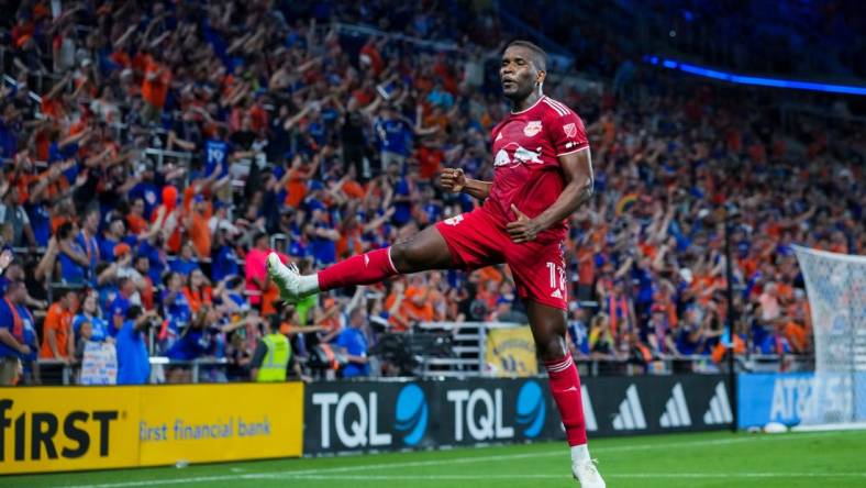 Oct 4, 2023; Cincinnati, Ohio, USA;  New York Red Bulls forward Elias Manoel (11) celebrates scoring a goal against FC Cincinnati in the second half at TQL Stadium. The goal was overturned after a video review. Mandatory Credit: Aaron Doster-USA TODAY Sports